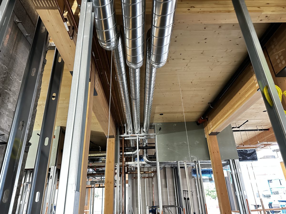 Exposed spiral duct on mass timber